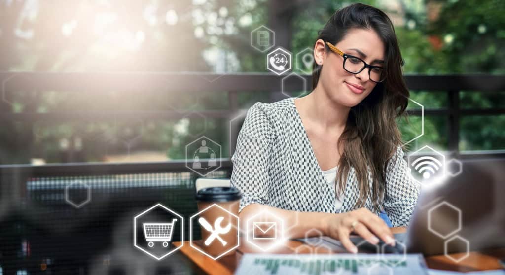 Ecommerce seller reviewing Amazon PPC performance for high-value products on a laptop, focusing on spend and campaign control.